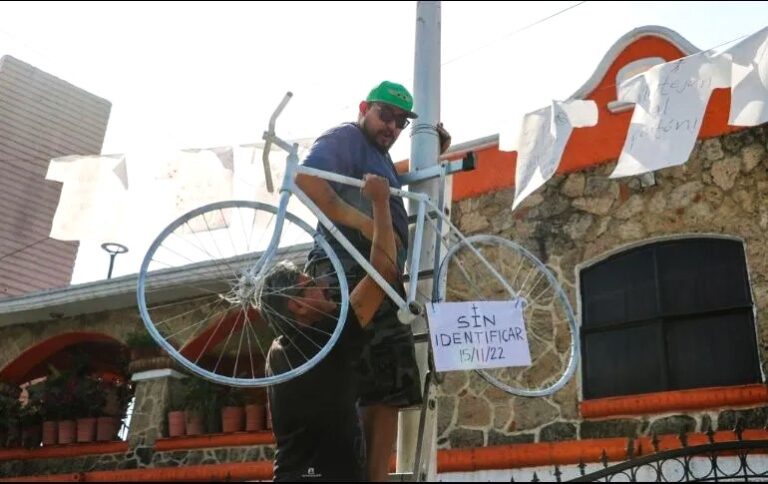 Representative White Bicycle and Tennis Shoes Placed at Periférico and López Mateos