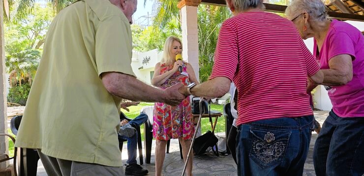 Copy-of-Christy-Carter-Caldwell-leads-a-dance-at-the-home-of-Elle-740x357